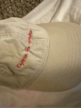 Beige Hat with Red Script Embroidery
